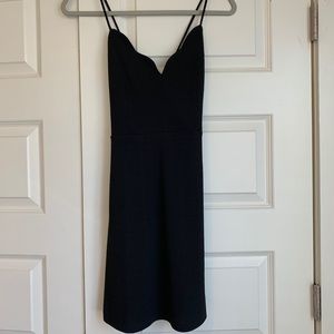 Black scalloped neck body con dress